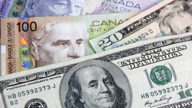 بيع الدولار الأمريكي مقابل الدولار الكندي لكن حذر!